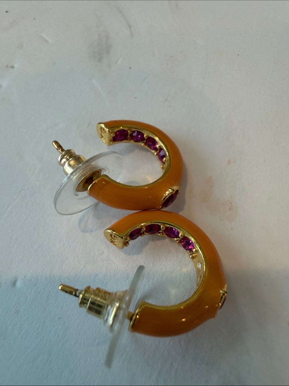 Kurt Geiger
Gold-Tone Orange Hoop Earrings with Pink Gem Accent - Picture 3 of 4